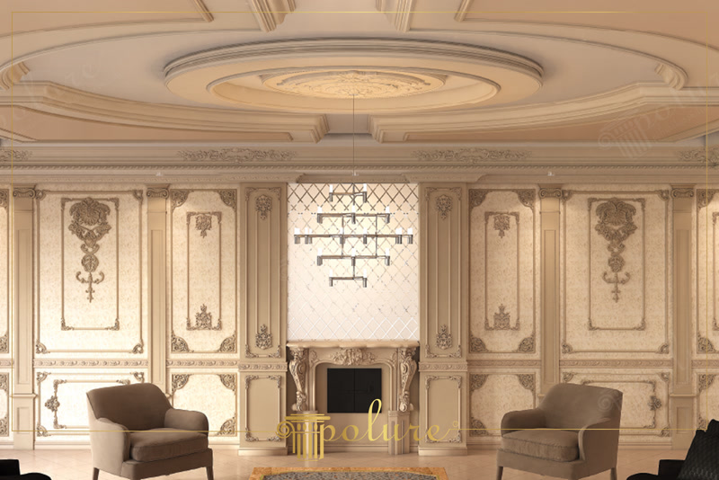 Şömine üzerine konumlandırılmış baklava aynayı saran poliüretan pilaster sütunlar ve zarif çıtalarla bezenmiş salon duvarı