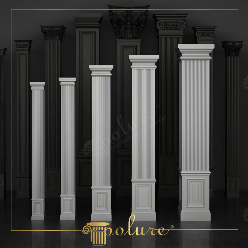 Koyu renk arka planda sergilenen çeşitli ebatlarda yivli dekoratif pilaster sütunlar.