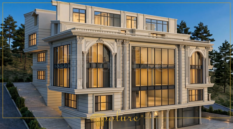 Çok katlı konut projesinde uygulanan kavisli pencere söveleri ve dikey beyaz pilaster sütunlar.